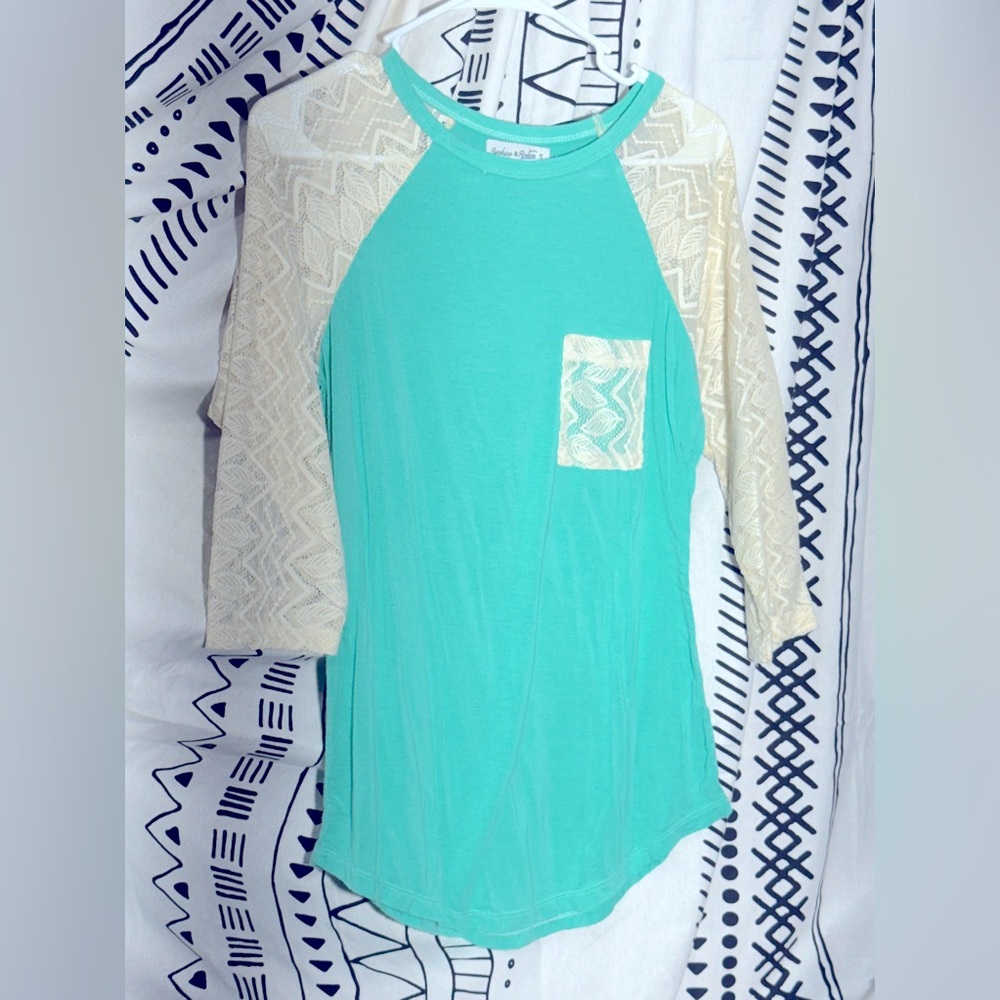 Teal with cream, lace, three-quarter sleeves
￼